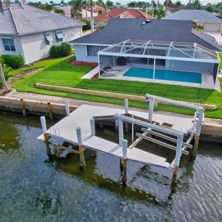 Buy this 3 bed house on 1862 Woodbine Ct in Marco Island, Florida