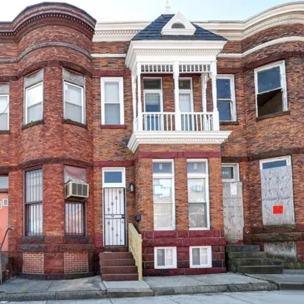 Buy this 4 bed house on 1807 West North Avenue in Baltimore, MD 21217