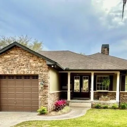 Buy this 4 bed house on 116 Hidden Oaks Drive in Lady Lake, FL 32159