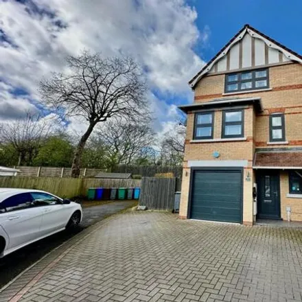 Rent this 4 bed townhouse on Riverstone Drive in Wythenshawe, M23 9QW