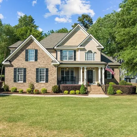 Buy this 5 bed house on 7317 Capulin Crest Drive in Cary, NC 27539
