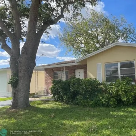 Rent this 2 bed house on 7389 Northwest 57th Court in Tamarac, FL 33321