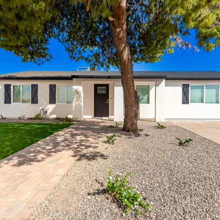 Buy this 4 bed house on 4102 East Joan De Arc Avenue in Phoenix, AZ 85032