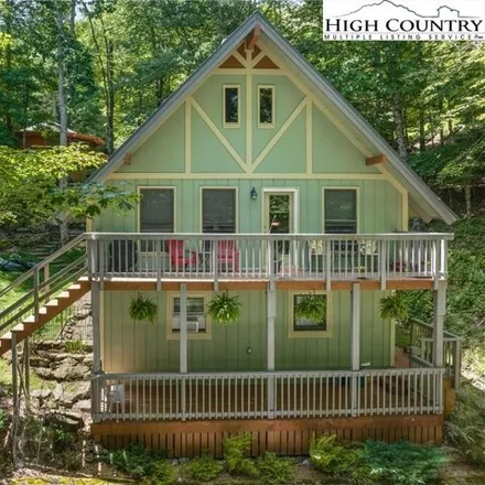 Buy this 4 bed house on 126 Foxgrape Hollow in Beech Mountain, NC 28604
