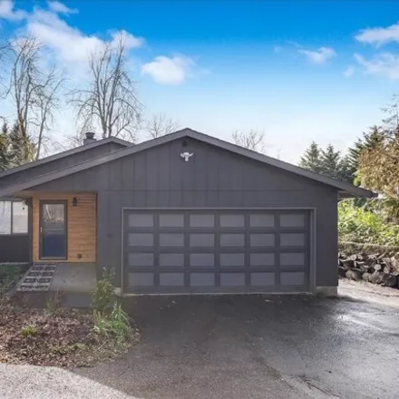 Buy this 3 bed house on 9281 Southwest Boones Ferry Road in Portland, OR 97219