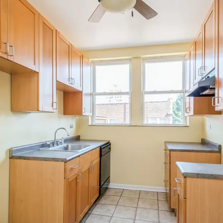 Rent this 2 bed apartment on 1219-1221 West Sherwin Avenue in Chicago, IL 60626