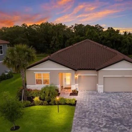 Buy this 4 bed house on 13708 Green Hammock Pl in Lakewood Ranch, Florida