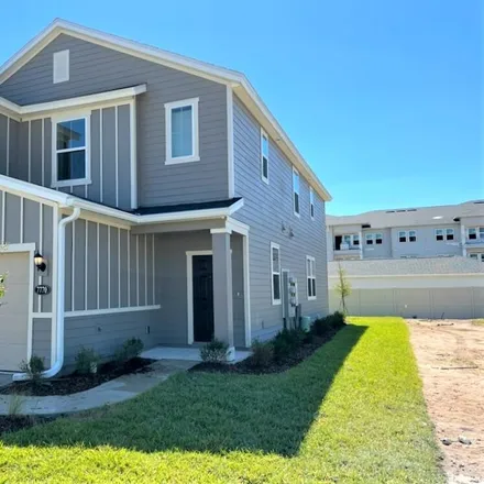Buy this 3 bed townhouse on Merchants Way in Jacksonville, FL 32222