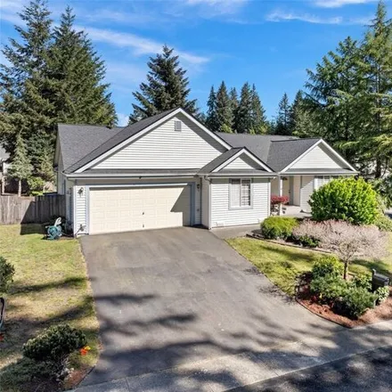 Buy this 3 bed house on 2248 Holiday Place Northwest in Country Lane, Erlands Point-Kitsap Lake