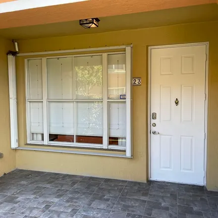 Rent this 3 bed apartment on 1635 Davis Road in Palm Springs, FL 33406