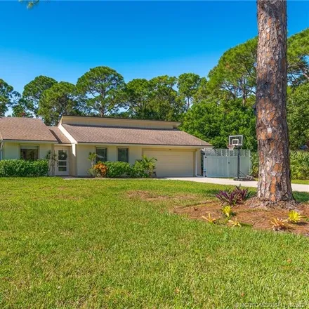 Buy this 4 bed house on 438 Northeast Bayberry Lane in Jensen Beach, FL 34957