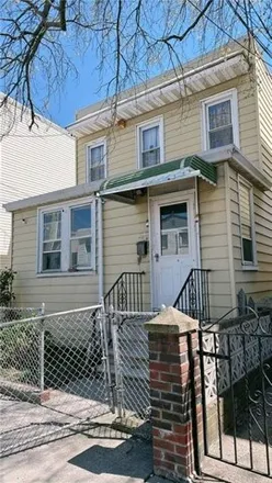 Buy this 3 bed house on 20-09 126th Street in New York, NY 11356