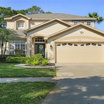 Rent this 4 bed house on 5612 Rockfield Loop in Hillsborough County, FL 33594