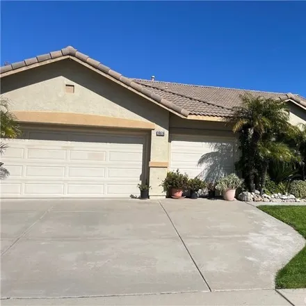 Rent this 3 bed house on Labrador Avenue in Fontana, CA 92336