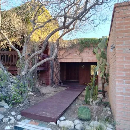 Buy this 3 bed house on 6100 E Paseo Ventoso in Tucson, Arizona