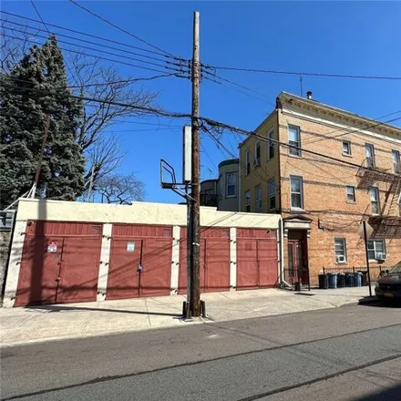 Buy this 7 bed house on 69-15 60th Lane in New York, NY 11385