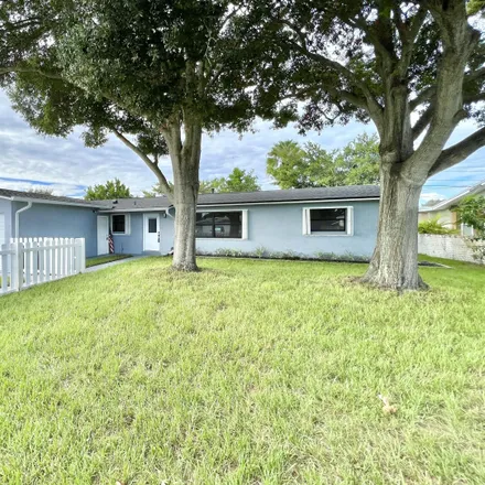 Buy this 4 bed house on 1411 South Belford Court in Merritt Island, FL 32952