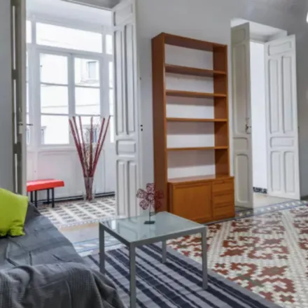 Rent this 7 bed room on Carrer dels Adressadors in 46001 Valencia, Spain