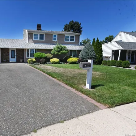 Buy this 4 bed house on 54 Woodpecker Lane in Levittown, NY 11756