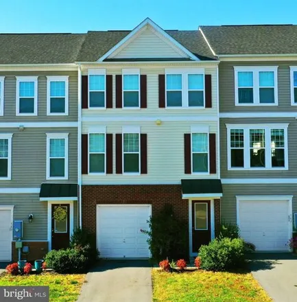 Rent this 3 bed townhouse on 125 Solara Drive in Frederick County, VA 22602