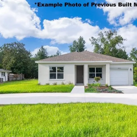 Buy this 4 bed house on 402 Krassner Drive Northwest in Palm Bay, FL 32907
