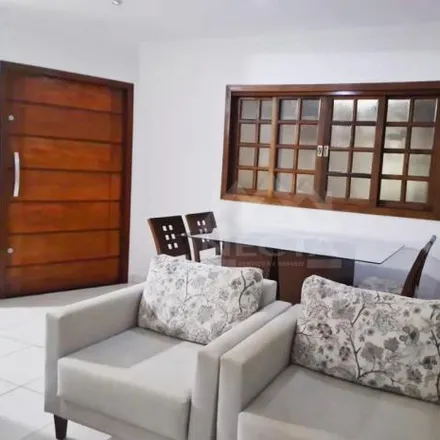 Buy this 4 bed house on Rua Antônio Carlos Quencal Simas in Golfinhos, Caraguatatuba - SP