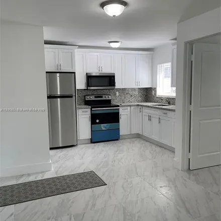 Rent this 2 bed apartment on 3180 Southwest 23rd Street in Silver Bluff Estates, Miami