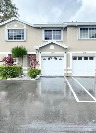Rent this 3 bed townhouse on 5019 Southwest 123rd Terrace in Cooper City, FL 33330