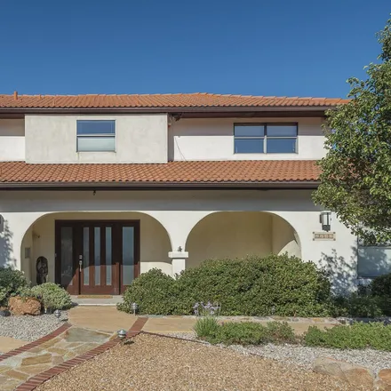 Rent this 4 bed house on 1105 Rocky Point Court Northeast in Eastrange-Piedra Vista, Albuquerque