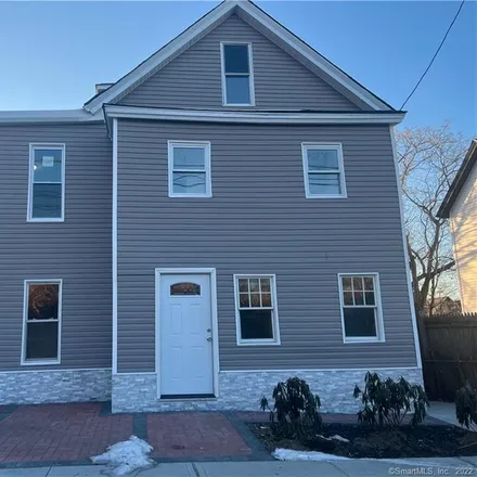 Buy this 7 bed townhouse on 1801 Central Avenue in Bridgeport, CT 06610