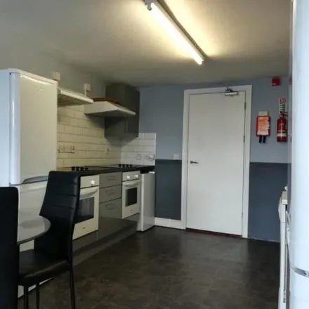 Rent this 8 bed townhouse on Uplands Launderette in Uplands Crescent, Swansea