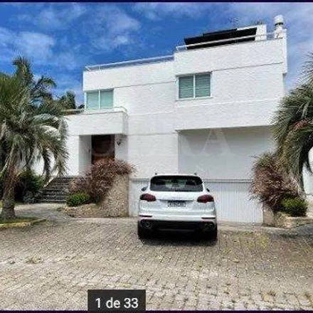 Buy this 4 bed house on Avenida dos Merlins in Jurerê Internacional, Florianópolis - SC