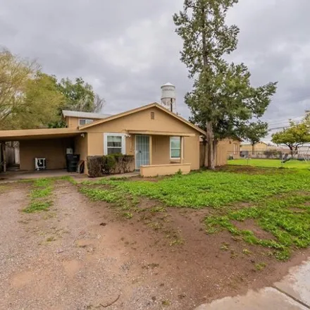Rent this 3 bed house on 180 West Northern Avenue in Coolidge, Pinal County