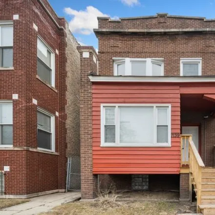 Buy this 7 bed house on 7139 South Doctor Martin Luther King Junior Drive in Chicago, IL 60621