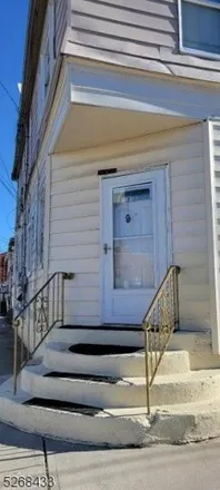 Buy this 7 bed house on 140 20th Avenue in Paterson, NJ 07501