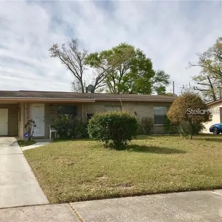 Rent this 4 bed house on 1482 Basie Place in Orlando, FL 32805