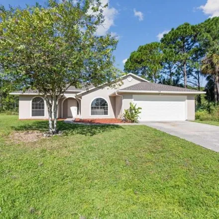 Buy this 3 bed house on 1438 Amador Avenue Northwest in Palm Bay, FL 32907