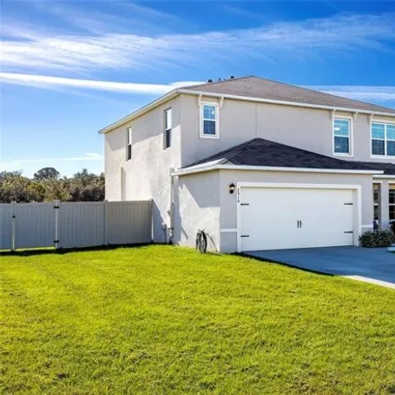 Buy this 5 bed house on 2510 Glacier Express Lane in Tavares, FL 32278