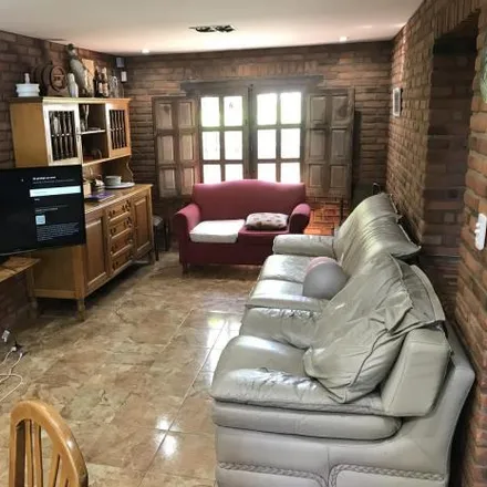 Buy this 3 bed house on unnamed road in Juan Vucetich, 1669 José C. Paz