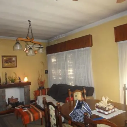 Buy this 4 bed house on General Zapiola in Partido de Lomas de Zamora, B1834 FYG Turdera