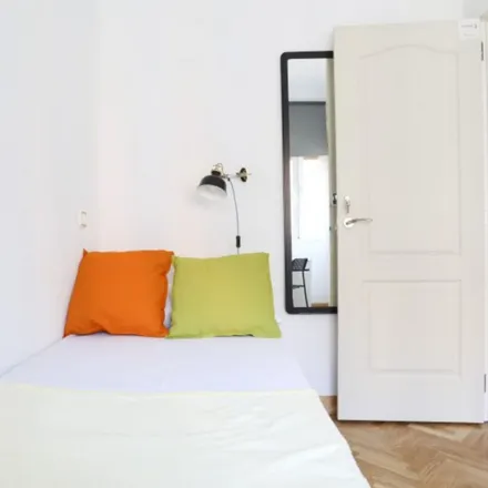 Rent this 6 bed room on Madrid in Calle de Ibiza, 36