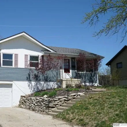 Buy this 4 bed house on 6283 Hartman Avenue in Omaha, NE 68104