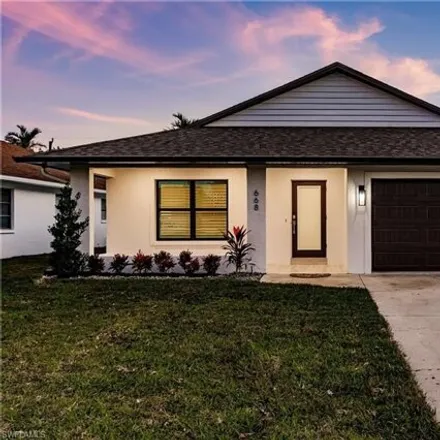 Buy this 4 bed house on 668 104th Avenue North in Collier County, FL 34108
