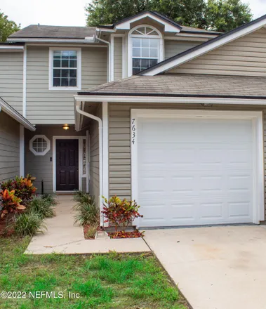 Buy this 3 bed townhouse on 7634 Rain Forest Drive North in Jacksonville, FL 32277