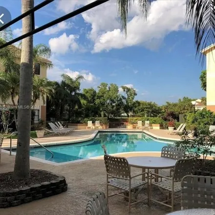 Rent this 1 bed condo on 9999 Summerbreeze Dr Apt 218 in Sunrise, Florida