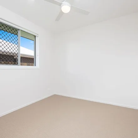 Rent this 4 bed apartment on Quarterdeck Avenue in Pialba QLD 4655, Australia