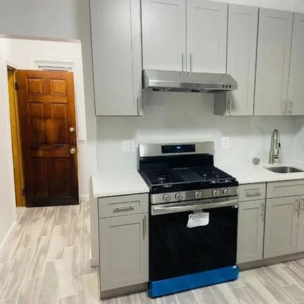 Rent this 3 bed apartment on 91-21 92nd Street in New York, NY 11421