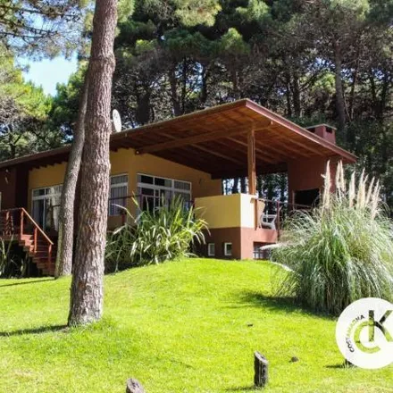 Rent this 4 bed house on Etoneo in Partido de Pinamar, Buenos Aires