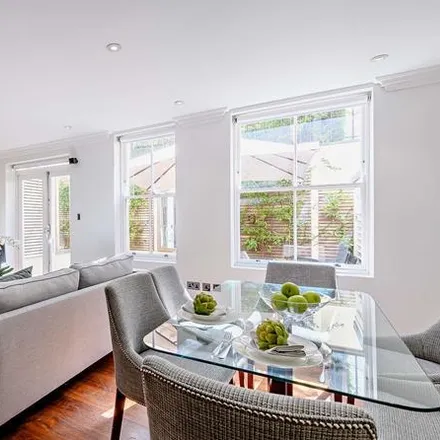 Rent this 3 bed apartment on Garden House in 86-92 Kensington Gardens Square, London
