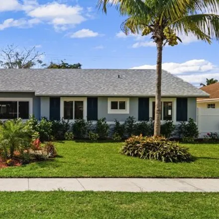 Buy this 4 bed house on 526 Northeast 38th Court in Tedder, Deerfield Beach